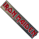 Rectangular metal badge with 'IRON MAIDEN' in red text on a silver background