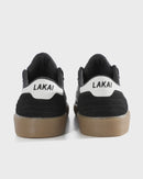 Black sneakers with 'Lakai' branding on a white background
