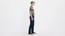 Person wearing a striped shirt and green cap on a white background