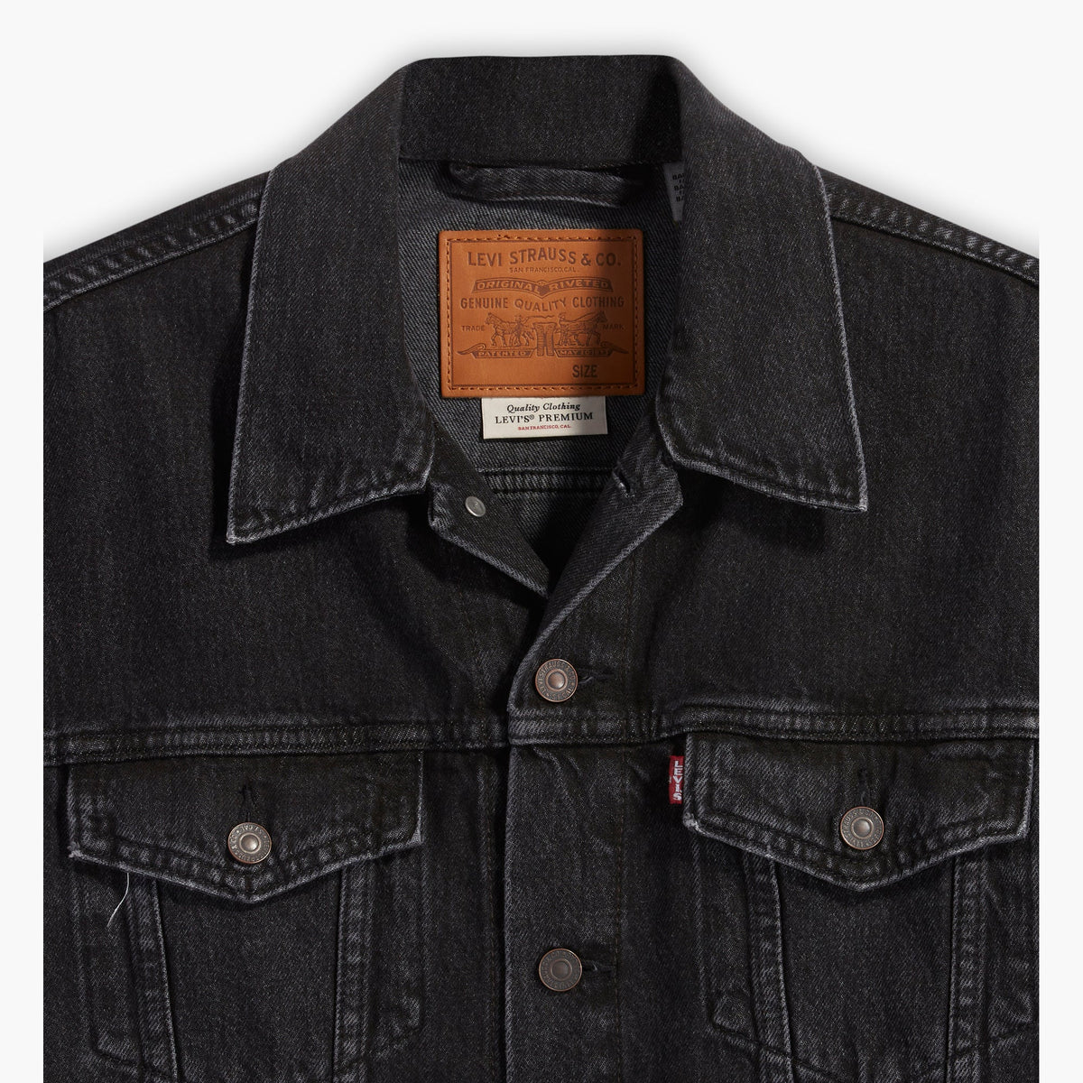 Black denim jacket with Levi's branding on a white background