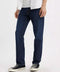 Person wearing dark blue jeans and a white shirt on a white background