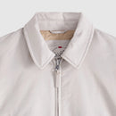 Light gray jacket with a zipper on a white background