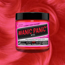 Manic Panic hair color jar on a red hair background
