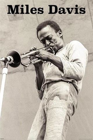 Black and white photo of Miles Davis playing trumpet with text 'Miles Davis' above.