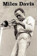 Black and white photo of Miles Davis playing trumpet with text 'Miles Davis' above.
