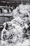 Album cover with a person sitting in front of a car with smoke or steam rising, featuring the text 'rage against the machine'.