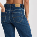 Blue jeans with a visible brand label on a white background