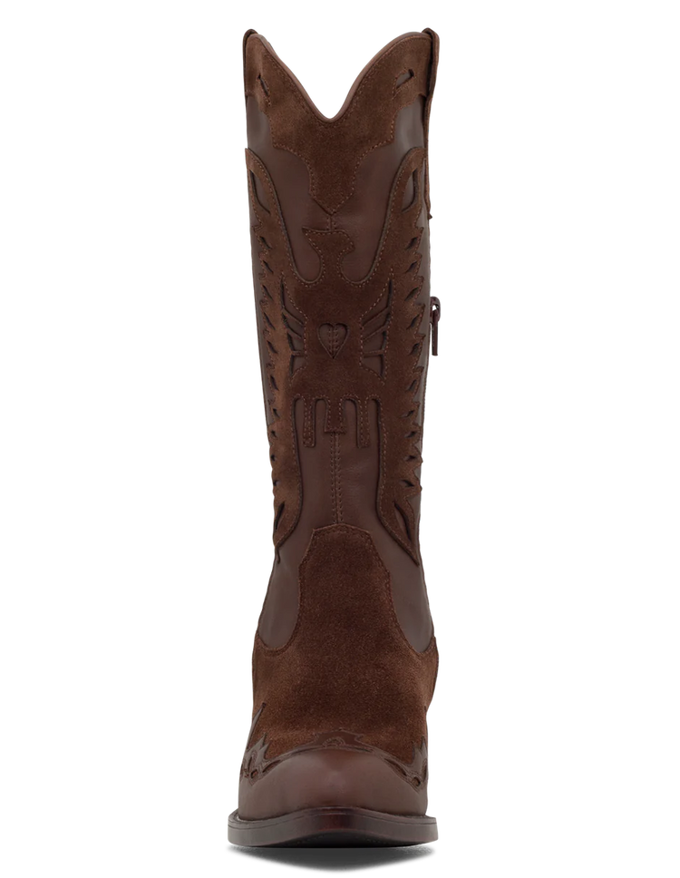 A tan suede boot with a pointed toe, decorative leather overlays, and a chunky heel.