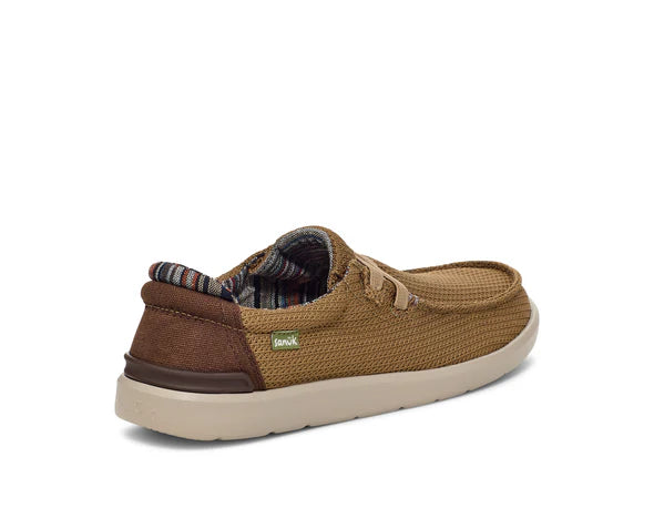 Brown slip-on shoe with plaid lining on a white background