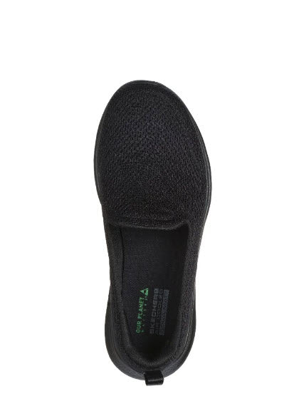 A pair of Skechers GO Walk 7 - Razi black slip-on athletic shoes with a mesh upper and a flat, wide sole.