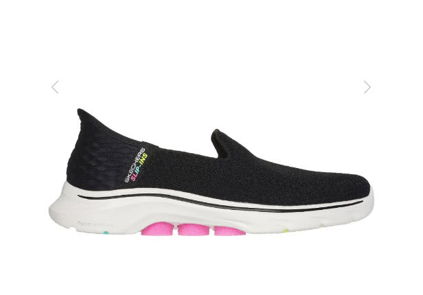 A pair of Skechers GO walk 7 Daley slip-in walking shoes with a black stretch knit upper and white sole.
