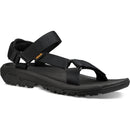 Black sandal with 'Teva' logo on a white background
