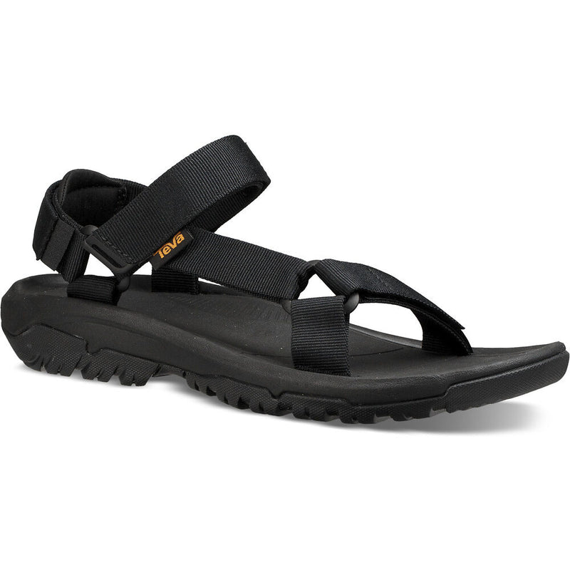 Black sandal with 'Teva' logo on a white background