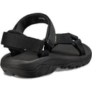 Black sandal with multiple straps on a white background