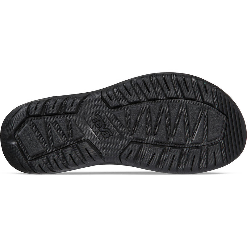 Black sole of a shoe with brand logo on a white background