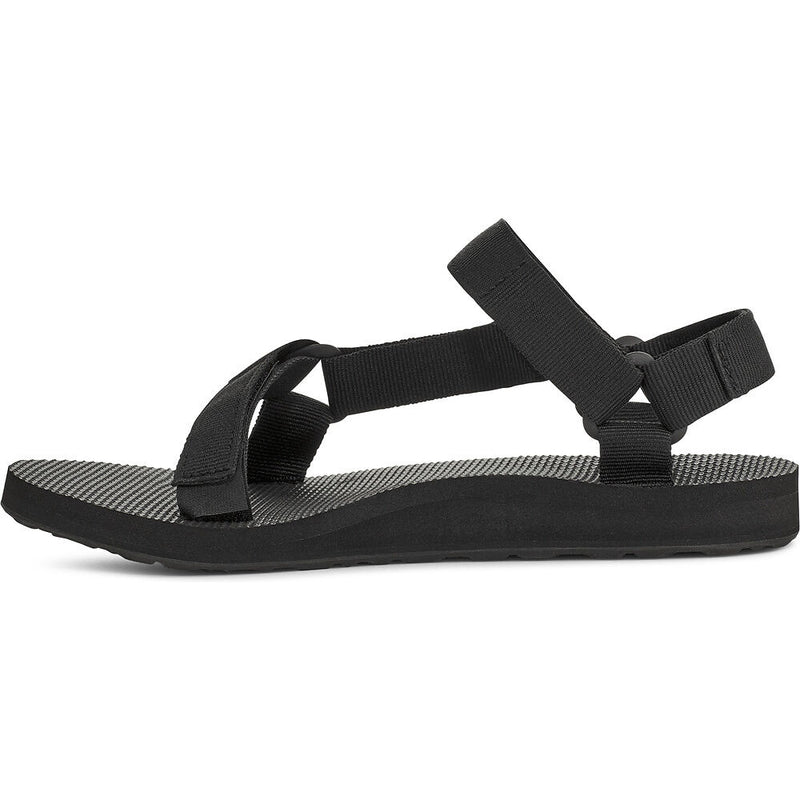 Black sandal with multiple straps on a white background