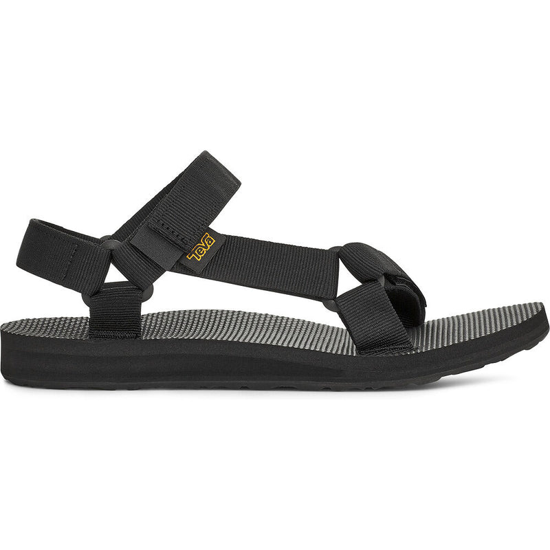 Black sandal with multiple straps on a white background
