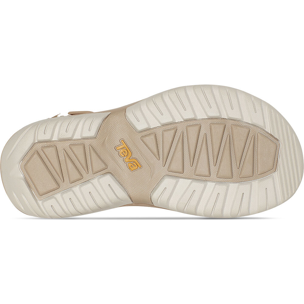 Close-up of a shoe sole with 'Teva' branding on a white background