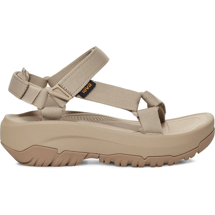 Beige sandal with multiple straps on a white background