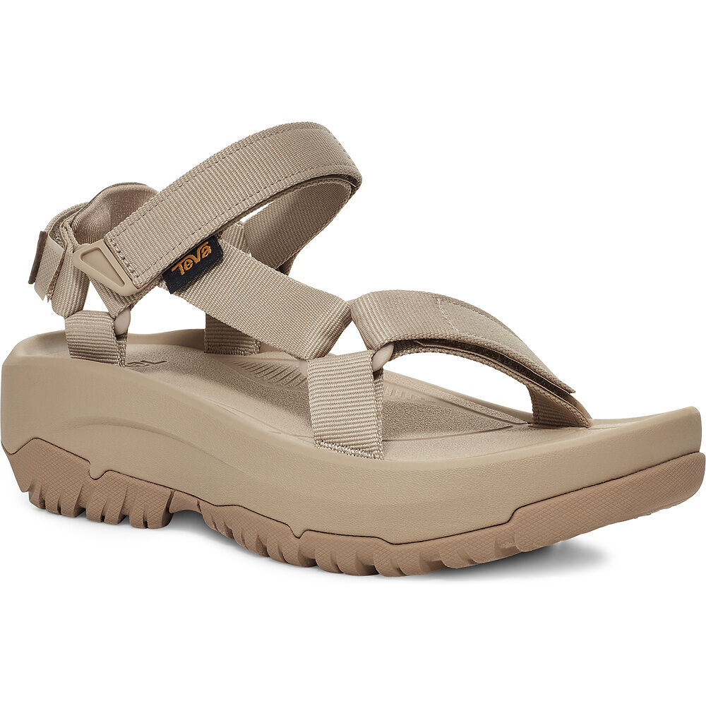 Beige sandal with multiple straps on a white background