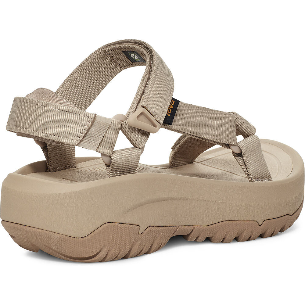 Beige sandal with multiple straps on a white background