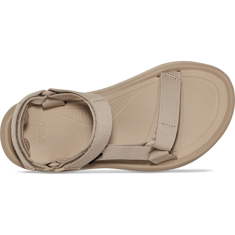 Beige sandal with a strap on a white background