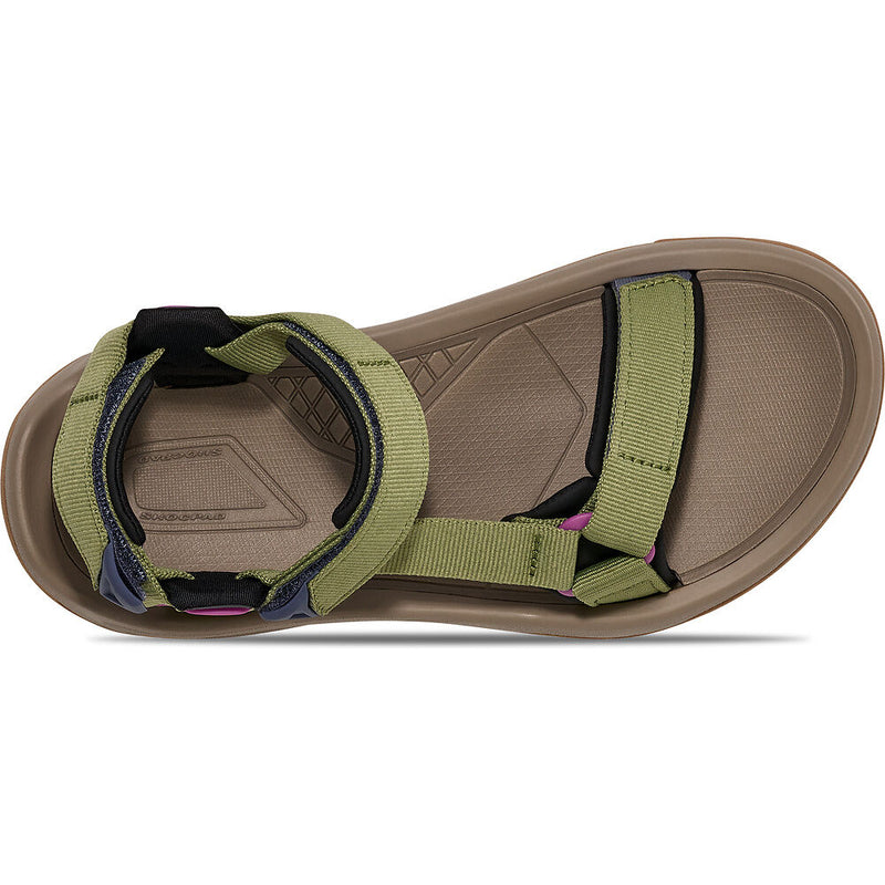 Brown sandal with green straps on a white background