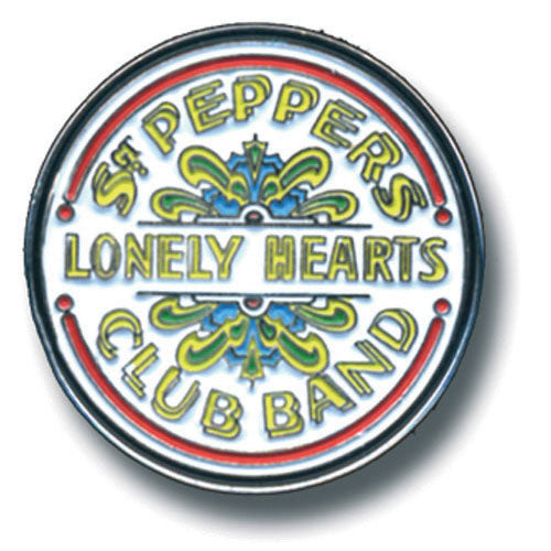 Circular badge with 'St. Pepper's Lonely Hearts Club Band' text and decorative elements on a white background
