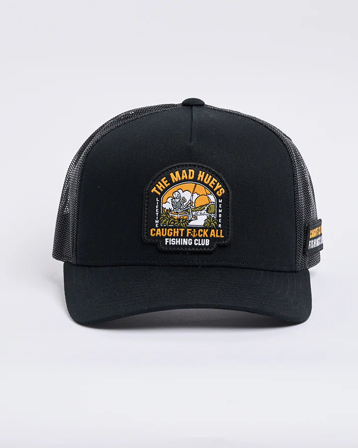 Black trucker cap with a patch on a white background