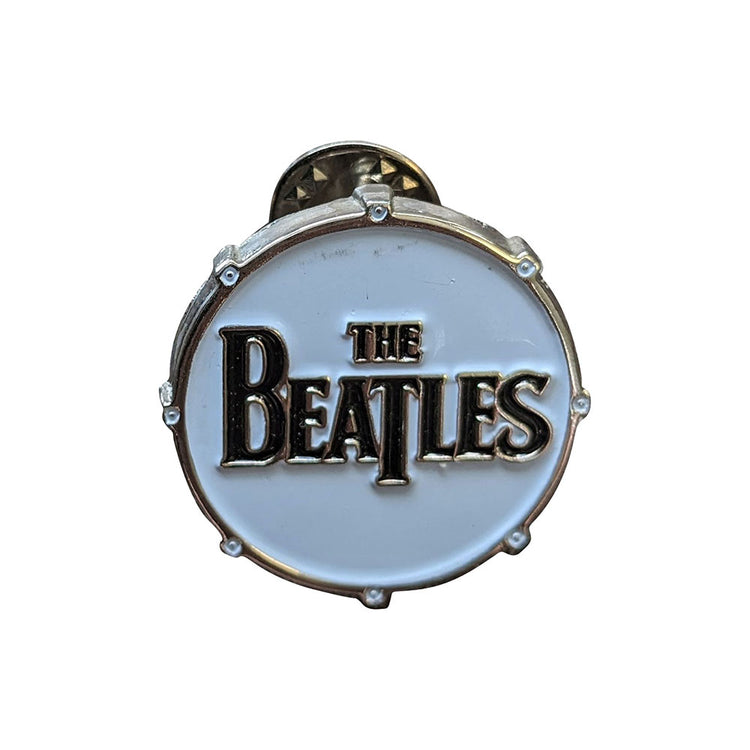 Decorative item with 'The Beatles' logo on a white background