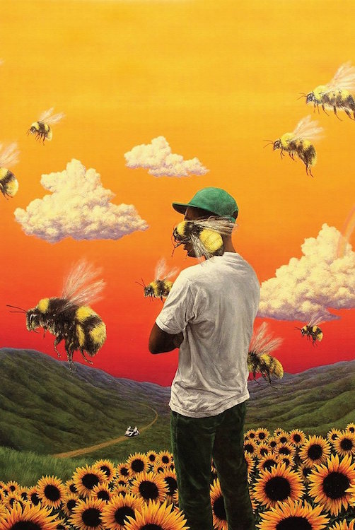 Man wearing a mask with bee design in a surreal landscape with sunflowers and bees.