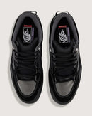 Black sneakers with a gray sole on a white background