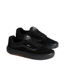 Black sneakers with a brand logo on a light gray background