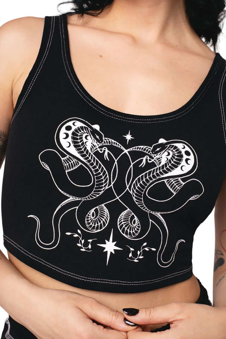 Black tank top with white snake design worn by a person