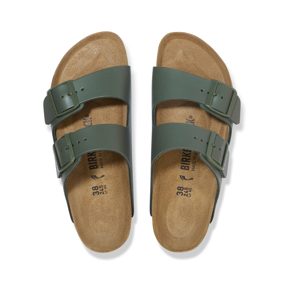 Pair of green sandals with cork sole on a white background