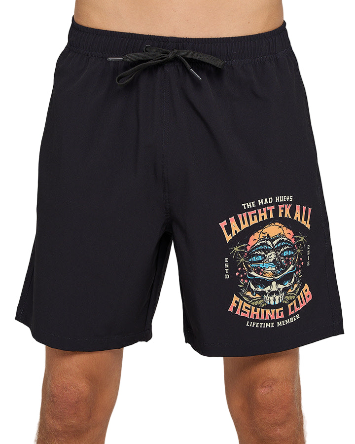 Black shorts with a colorful graphic design on a gray background