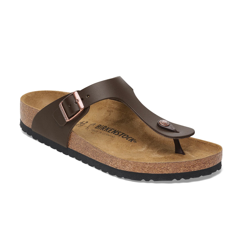 Brown sandal with cork sole on a white background