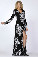 Front view of the SASS Hattie Wrap Maxi Dress in black with white floral print