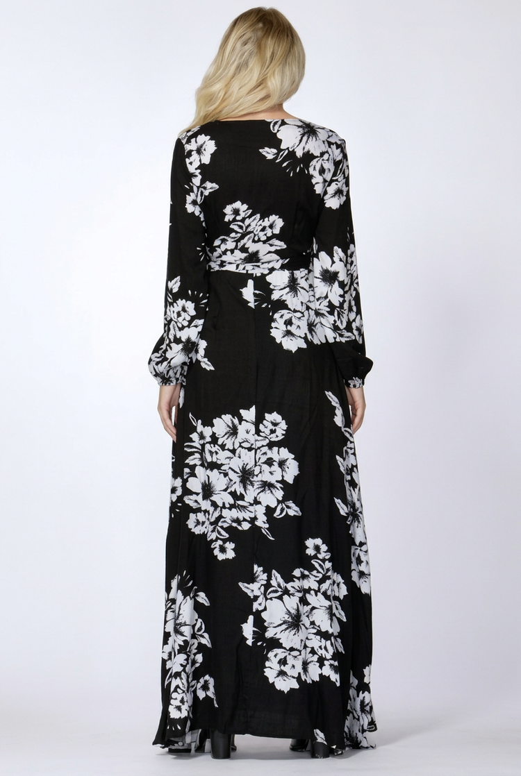 Back view of the SASS Hattie Wrap Maxi Dress in black with white floral print