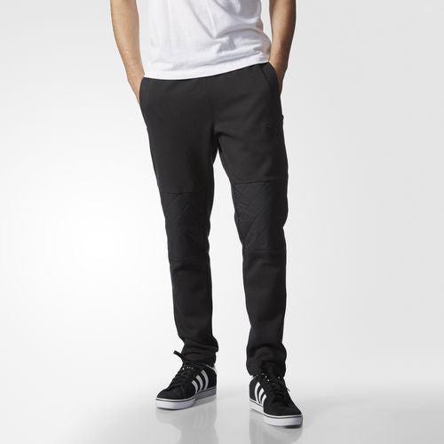 Adidas Originals Quilted Track Pant Black AJ7883 Quilted panels bring a basketball-inspired look to an essential street style.  Famous Rock Shop. 517 Hunter Street Newcastle, 2300 NSW Australia