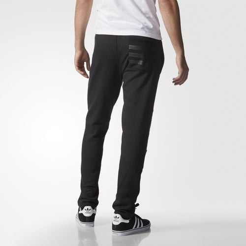 Adidas Originals Quilted Track Pant Black AJ7883 Quilted panels bring a basketball-inspired look to an essential street style.  Famous Rock Shop. 517 Hunter Street Newcastle, 2300 NSW Australia