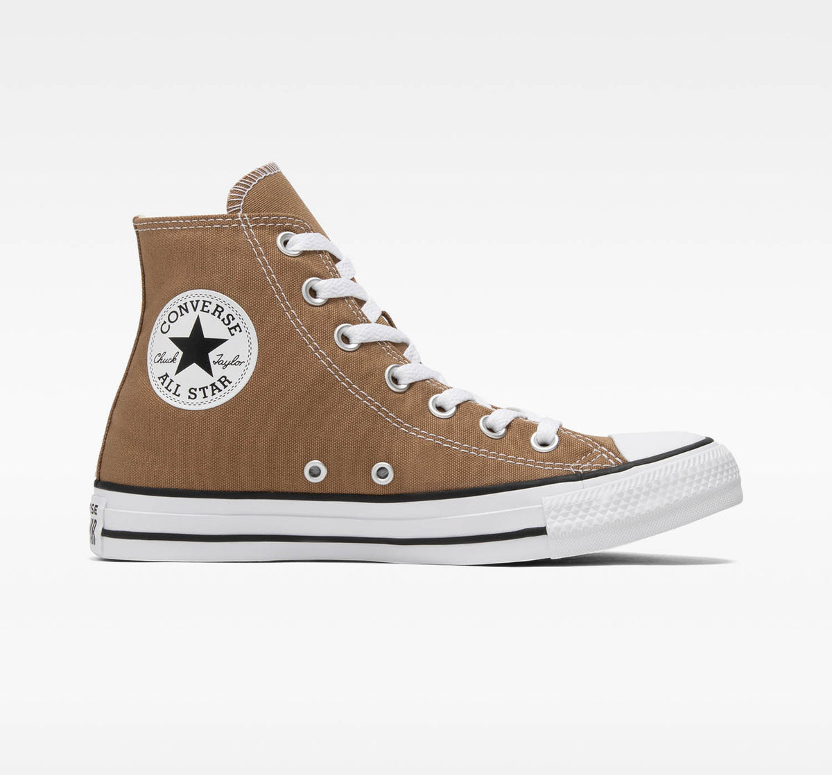 A pair of Converse Chuck Taylor All Star high-top sneakers in sand dune brown color.