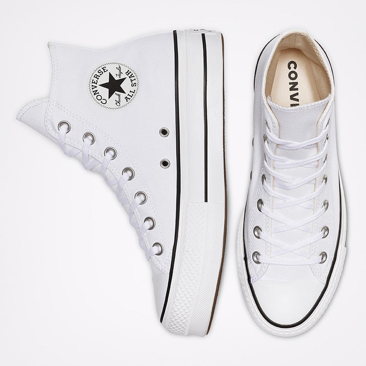 A pair of white Converse CT AS Lift Canvas HI high-top sneakers with a platform sole, classic star ankle patch, and lace-up style.