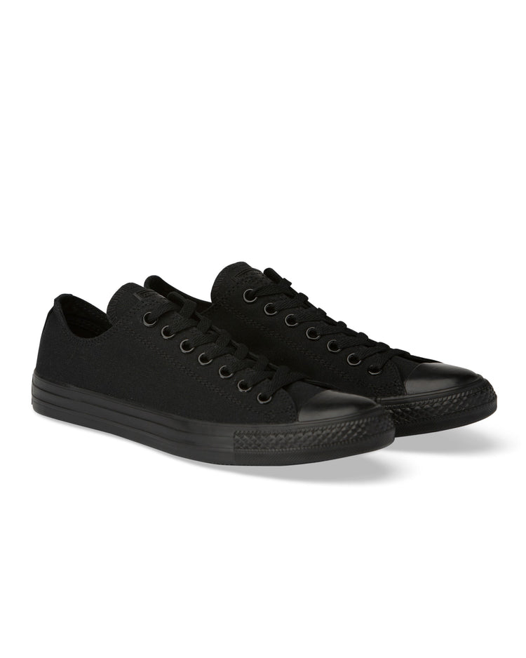 A pair of Converse Chuck Taylor All Star Classic Low Top sneakers in black mono canvas color