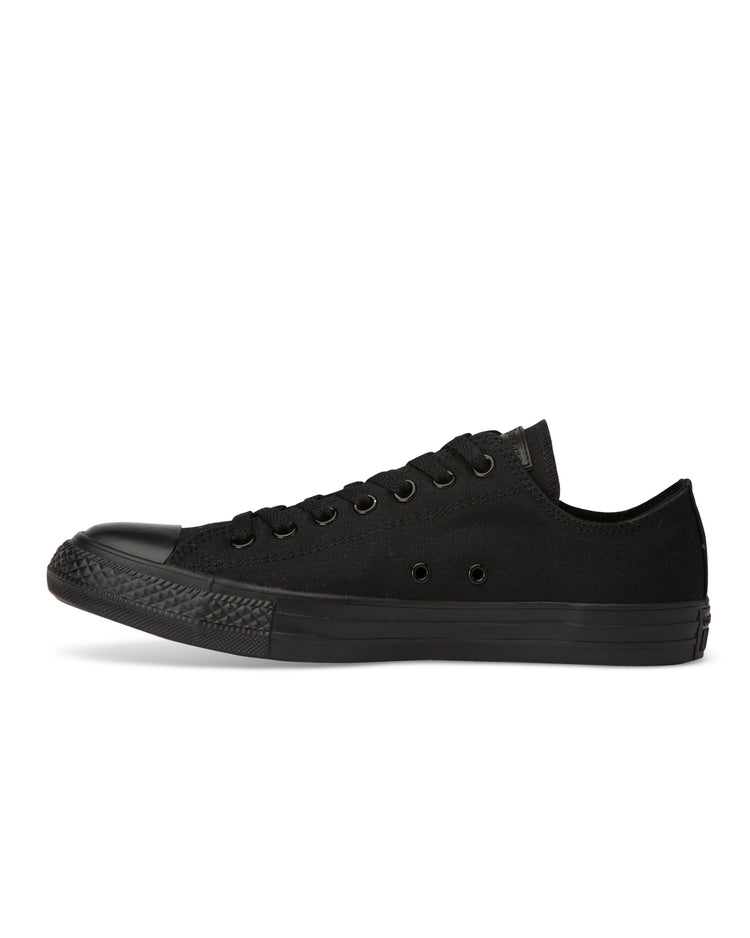 A pair of Converse Chuck Taylor All Star Classic Low Top sneakers in black mono canvas color