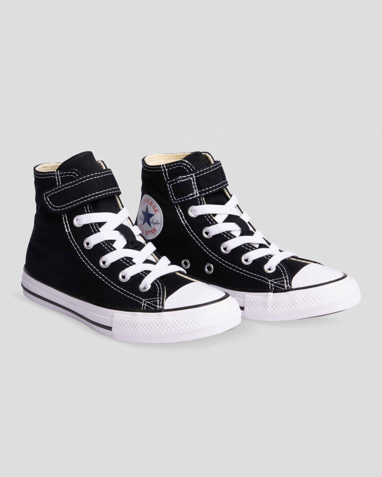 A pair of black Converse Chuck Taylor All Star Easy On 1V Junior high-top sneakers with hook-and-loop strap and elastic laces.