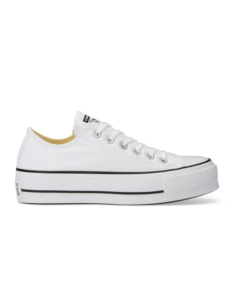 Converse Chuck Taylor All Star Lift Platform Ox white low-top sneaker with a double-stacked sole for added height, featuring a canvas upper, lace-up style, and EVA cushioning for comfort.