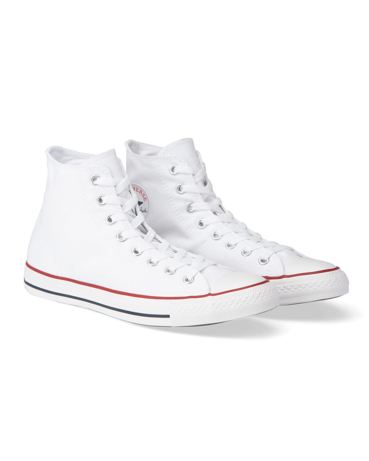 A high-top Converse Chuck Taylor All Star sneaker in optical white canvas color with red and blue detailing.