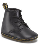 A black Dr Martens Auburn Crib Lace boot for newborns with a yellow stitch and a fabric heel loop.