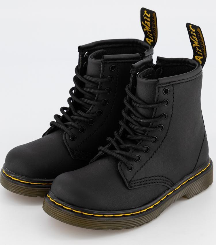 A pair of Dr Martens 1460 infants' black leather boots with yellow stitching on the sole.